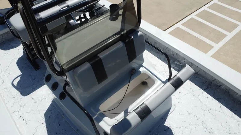 Slide: The Image of 2024 Majek 21RFL boat interior with seat and console. - 29