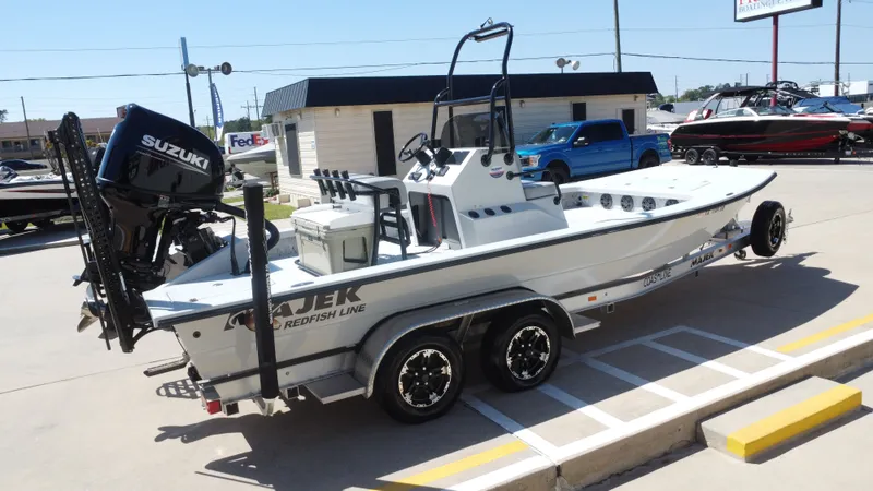 Slide: The Image of 2024 Majek 21RFL boat with Suzuki engine on trailer. - 6