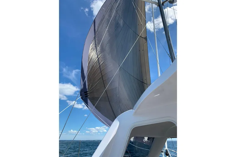 Slide: The Image of Sailing on a 2022 Seawind 1160 Lite with Diesel Motors under clear blue skies. - 7