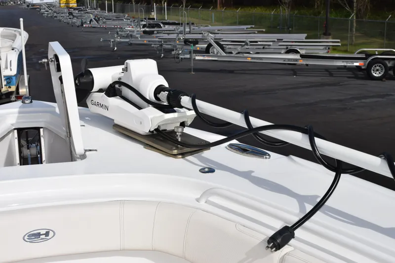 Slide: The Image of 2023 Sea Hunt Ultra 305 SE boat with Garmin equipment on deck. - 18