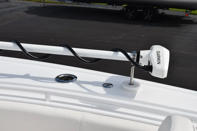 Slide: The Image of 2023 Sea Hunt Ultra 305 SE boat with Garmin marine equipment installed. - 19