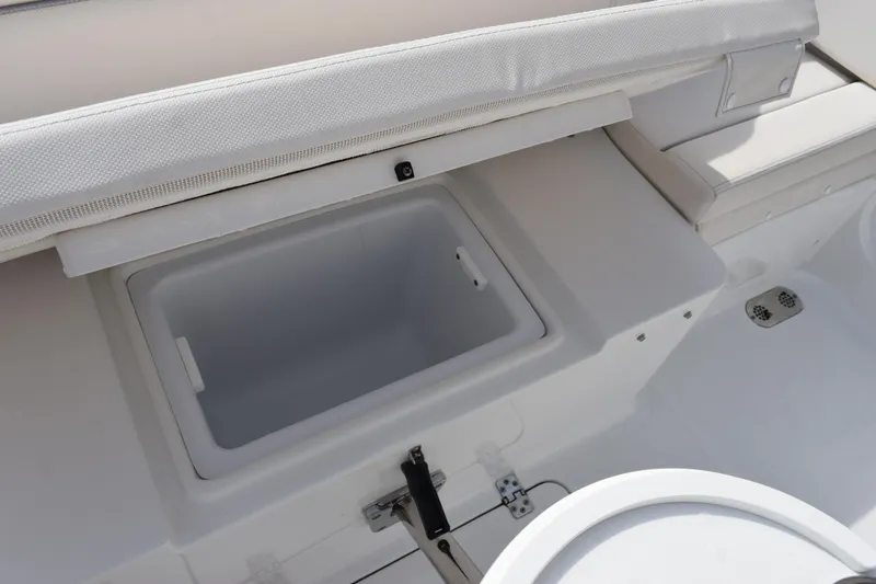 Slide: The Image of 2023 Sea Hunt Ultra 305 SE boat interior storage compartment. - 30