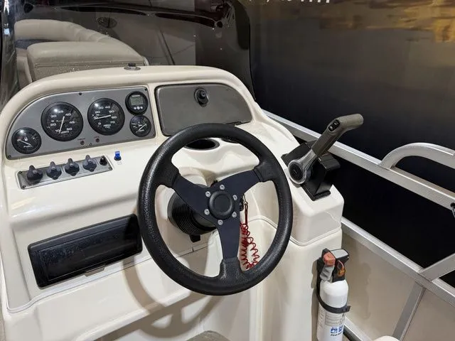 Slide: The Image of SunCatcher LX3 Tri-Toon W/ Yamaha 150 2004 - 16