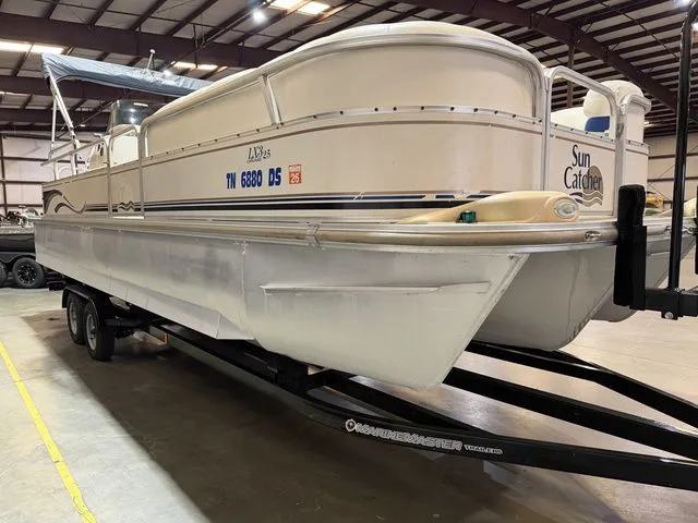 Slide: The Image of SunCatcher LX3 Tri-Toon W/ Yamaha 150 2004 - 7