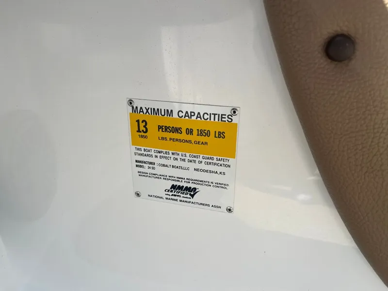 Slide: The Image of Cobalt 24SD 2016 boat capacity: 13 persons or 1850 pounds. - 13