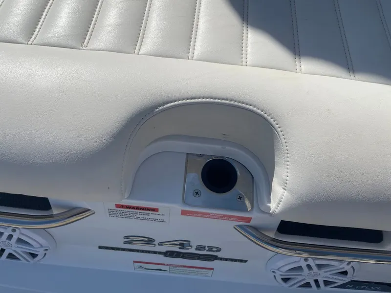 Slide: The Image of Rear view of a 2016 Cobalt 24SD boat with speakers. - 40