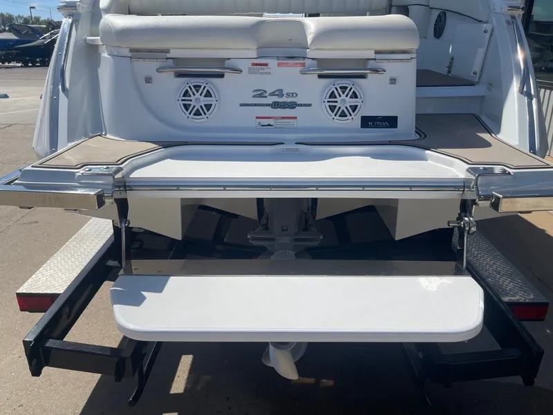 Slide: The Image of Rear view of a 2016 Cobalt 24SD boat with swim platform. - 7