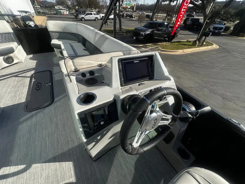 Slide: The Image of Interior of the 2022 Harris Sunliner 250 pontoon boat. - 12
