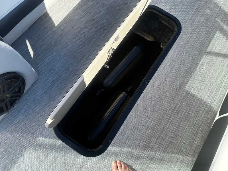 Slide: The Image of Storage compartment in Harris Sunliner 250 boat, 2022 model. - 20