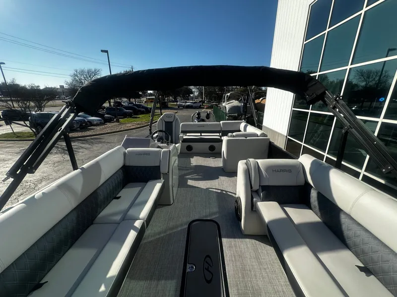 Slide: The Image of Interior view of a 2022 Harris Sunliner 250 pontoon boat. - 9
