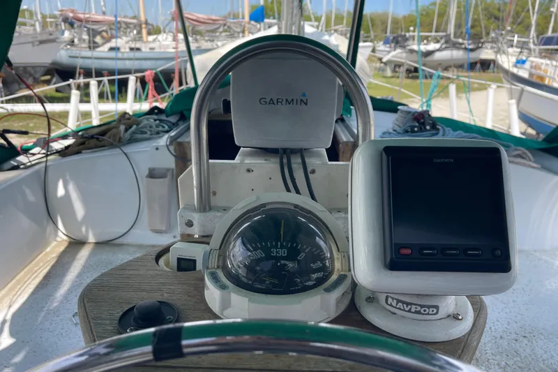 Slide: The Image of Cockpit of Irwin 37 Mk V sailboat with Garmin navigation equipment. - 17
