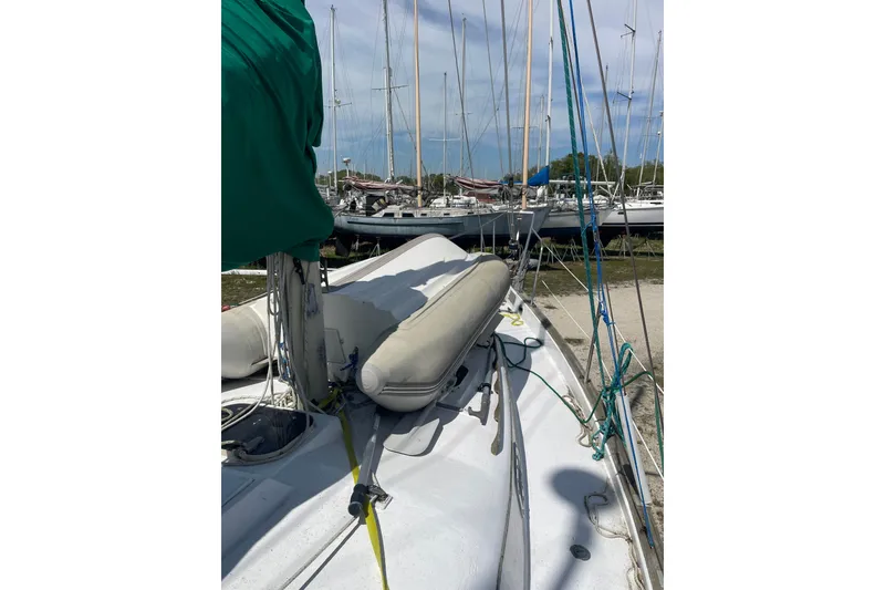 Slide: The Image of Sailboat deck view of Irwin 37 Mk V with green sail cover. - 8