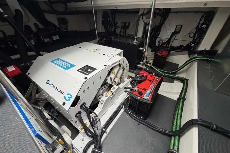 Slide: The Image of Engine compartment of 2025 Formula 380 Super Sport Crossover OB with Seakeeper 3 stabilizer. - 17