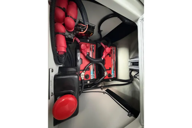 Slide: The Image of Engine compartment of 2025 Formula 380 Super Sport Crossover OB, showcasing battery and wiring. - 18