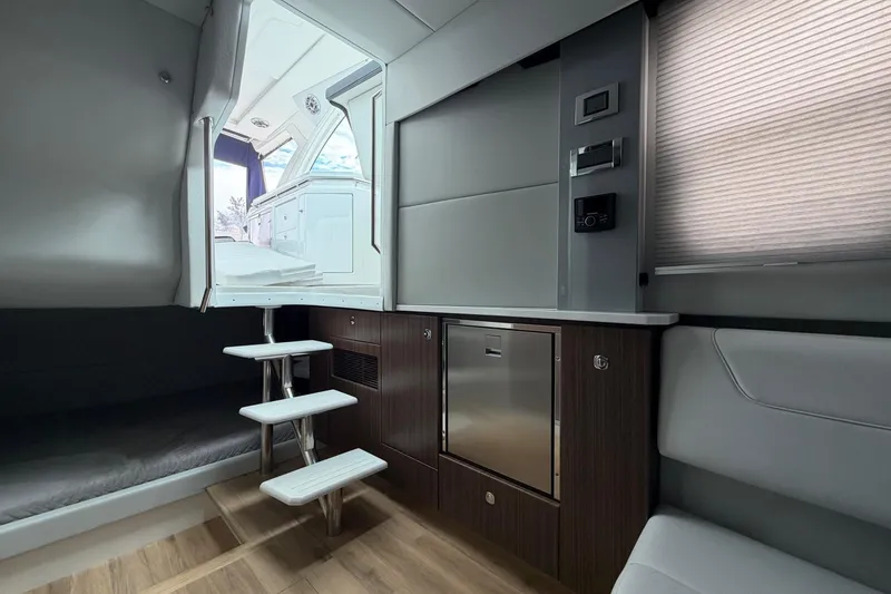 Slide: The Image of Interior of 2025 Formula 380 Super Sport Crossover OB, featuring modern cabin and sleek design. - 29