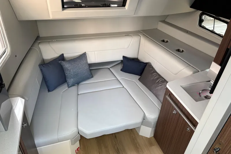 Slide: The Image of Luxurious interior of 2025 Formula 380 Super Sport Crossover OB with plush seating and modern amenities. - 31