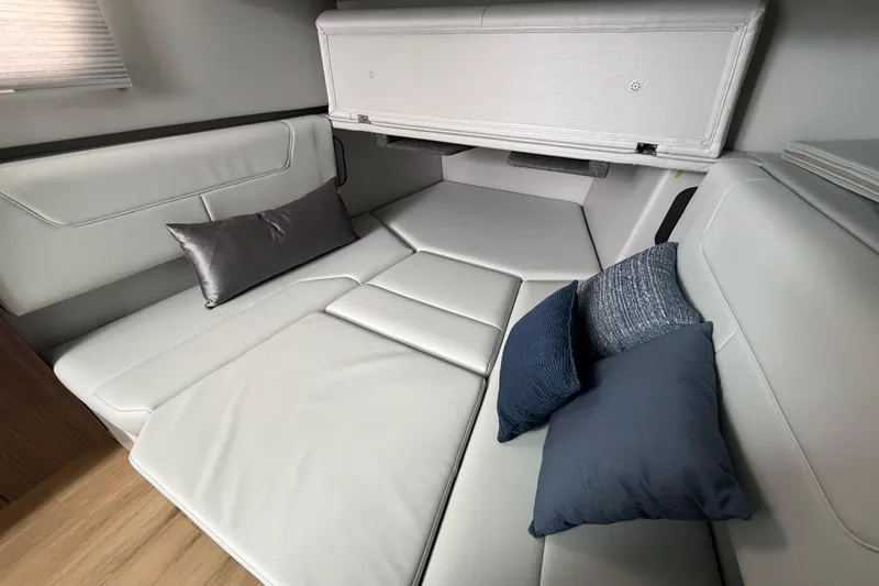 Slide: The Image of Luxurious interior of 2025 Formula 380 Super Sport Crossover OB with plush seating and cushions. - 34