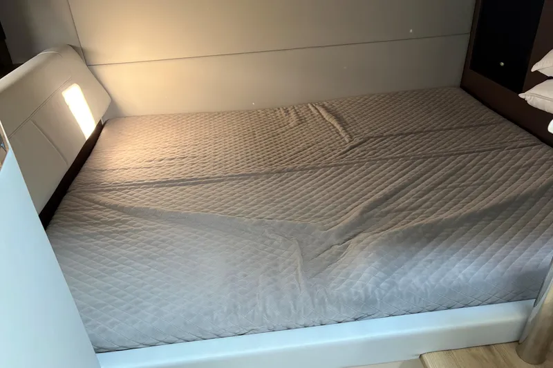 Slide: The Image of Interior cabin bed in 2025 Formula 380 Super Sport Crossover OB boat. - 36