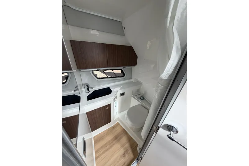 Slide: The Image of Modern bathroom interior in 2025 Formula 380 Super Sport Crossover OB boat. - 39