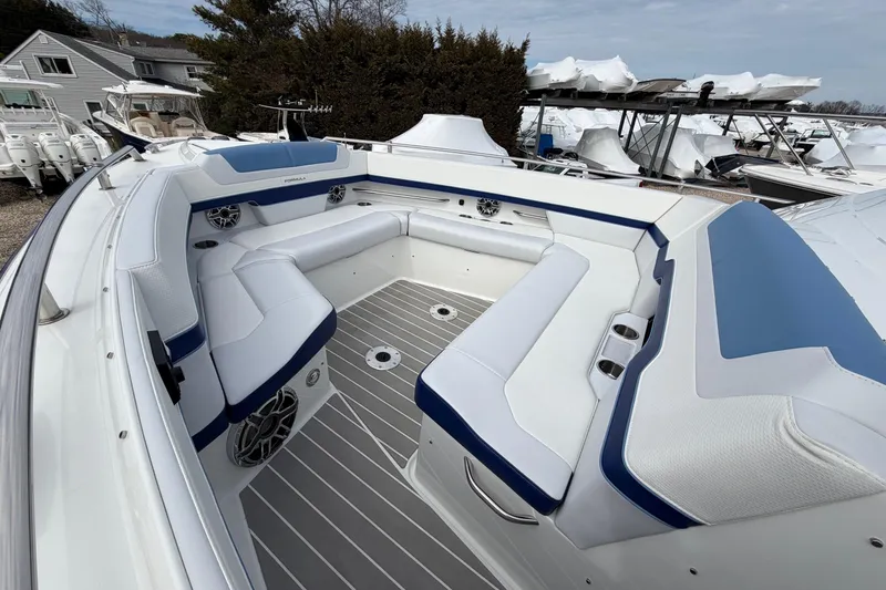 Slide: The Image of 2025 Formula 380 Super Sport Crossover OB boat interior with sleek seating and modern design. - 42