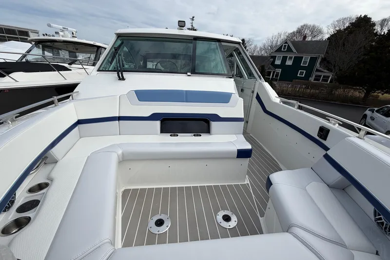 Slide: The Image of 2025 Formula 380 Super Sport Crossover OB boat interior with sleek seating and modern design. - 44