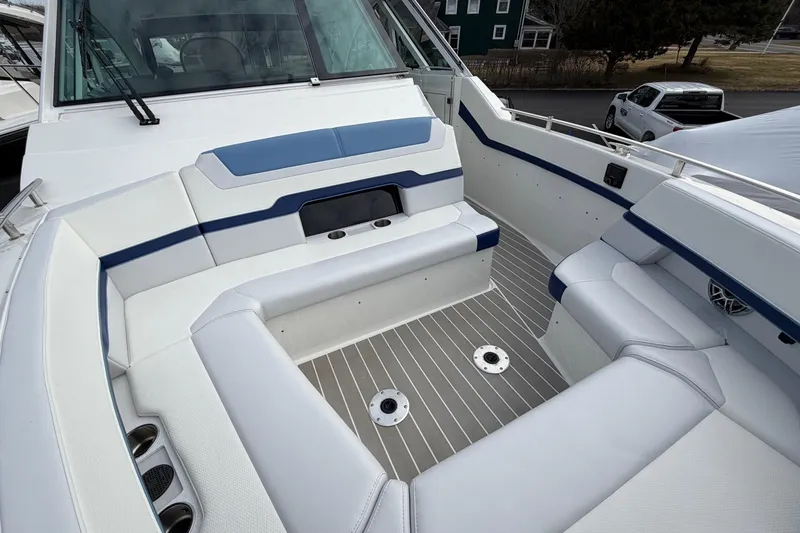 Slide: The Image of 2025 Formula 380 Super Sport Crossover OB boat interior with sleek seating and modern design. - 45