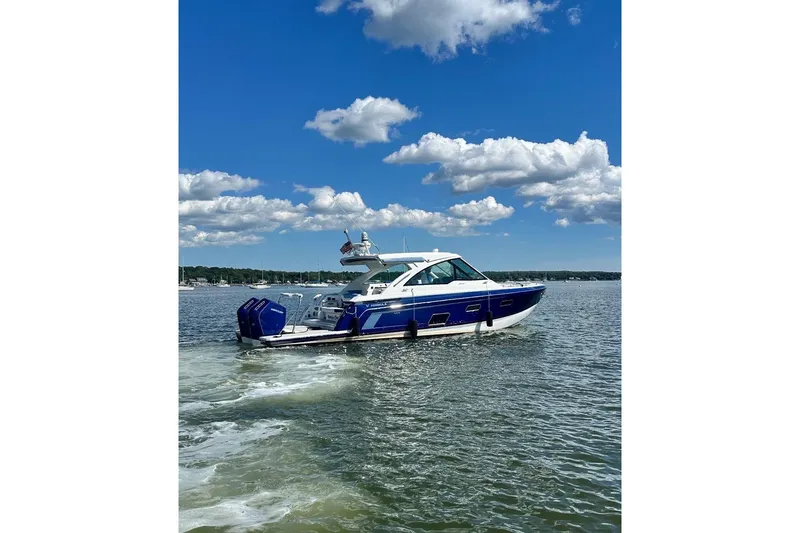 Slide: The Image of 2025 Formula 380 Super Sport Crossover OB cruising on a sunny day. - 53