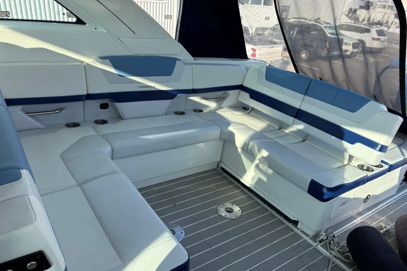 Slide: The Image of Luxurious seating area on 2025 Formula 380 Super Sport Crossover OB boat. - 6