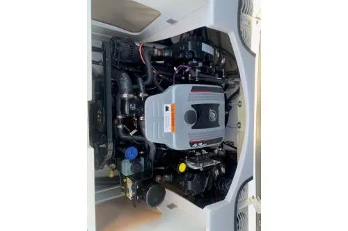 Slide: The Image of Engine compartment of a 2011 Four Winns H200 boat, showcasing detailed mechanical components. - 8