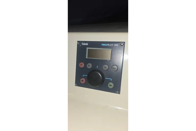 Slide: The Image of Cetrek ProPilot 700 control panel on 1986 Tollycraft 34 Sundeck yacht. - 10