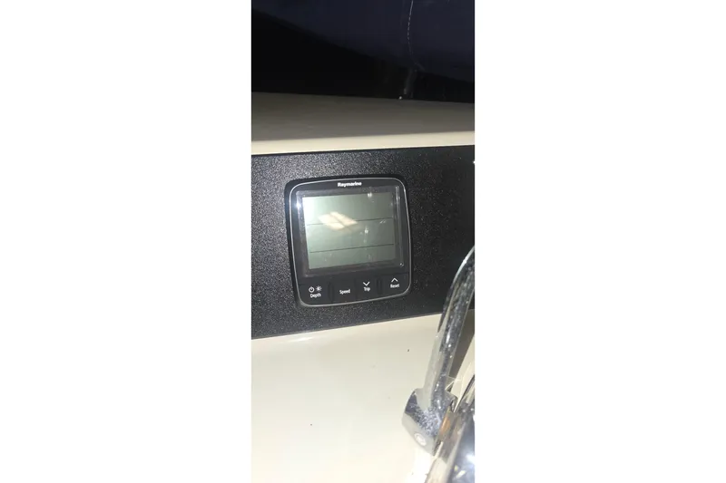 Slide: The Image of Raymarine display on 1986 Tollycraft 34 Sundeck boat dashboard. - 9