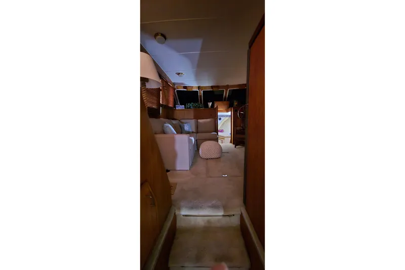 Slide: The Image of Interior of 1986 Tollycraft 34 Sundeck yacht with cozy seating area. - 26