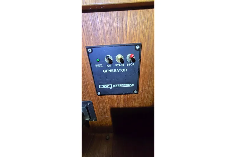 Slide: The Image of Control panel for Westerbeke generator on 1986 Tollycraft 34 Sundeck boat. - 37