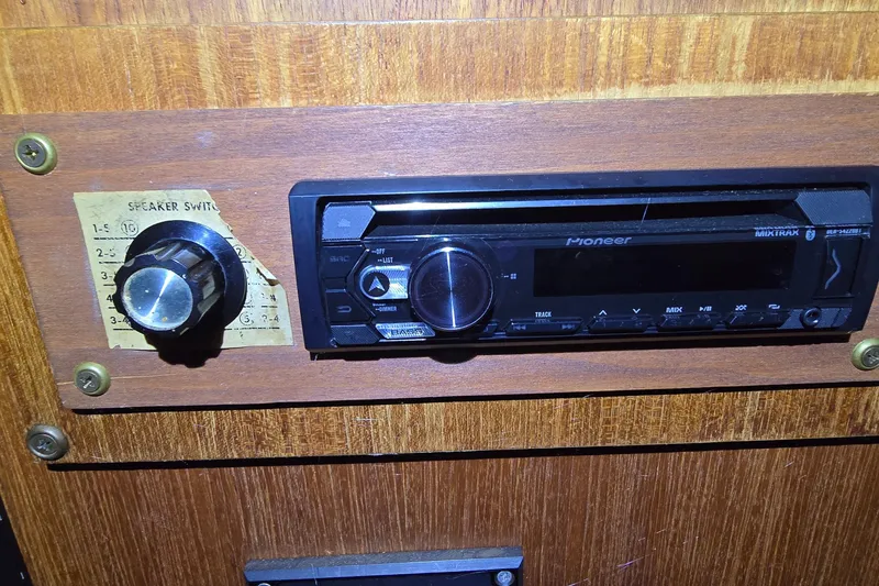 Slide: The Image of Pioneer stereo system and speaker switch on 1986 Tollycraft 34 Sundeck boat. - 38