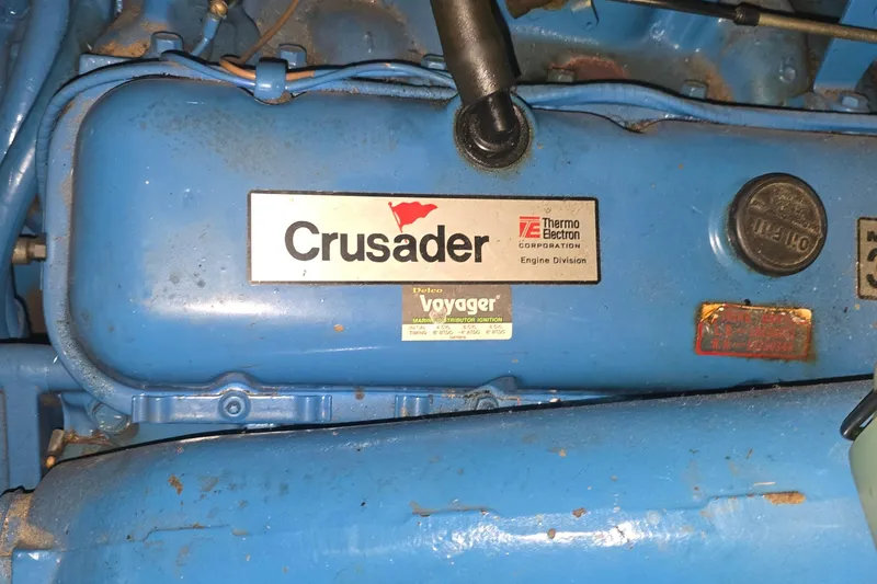 Slide: The Image of 1986 Tollycraft 34 Sundeck engine, Crusader by Thermo Electron, blue with labels. - 64