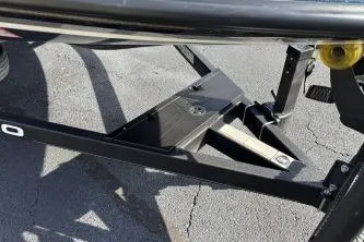 Slide: The Image of 2023 Nitro Z21 XL boat trailer detail on pavement. - 13