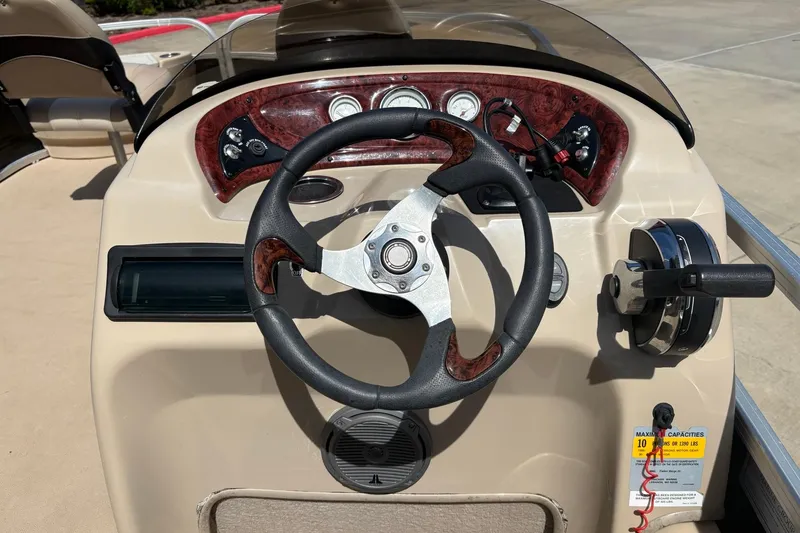 Slide: The Image of Steering console of 2013 Sun Tracker Fishin' Barge 22 DLX pontoon boat. - 3