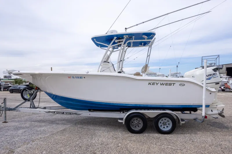 Slide: The Image of 2016 Key West 244 Center Console boat on trailer, side view. - 8