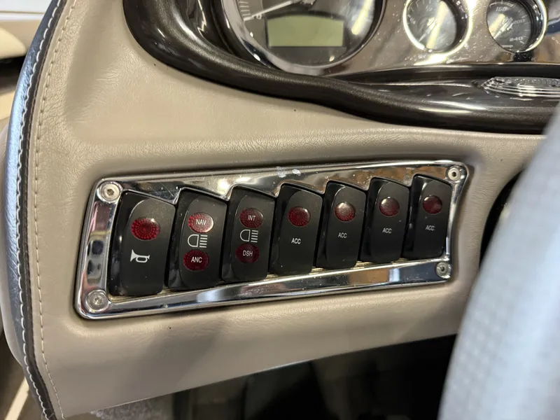 Slide: The Image of Dashboard of a 2007 Malibu Response LXi with switches. - 14