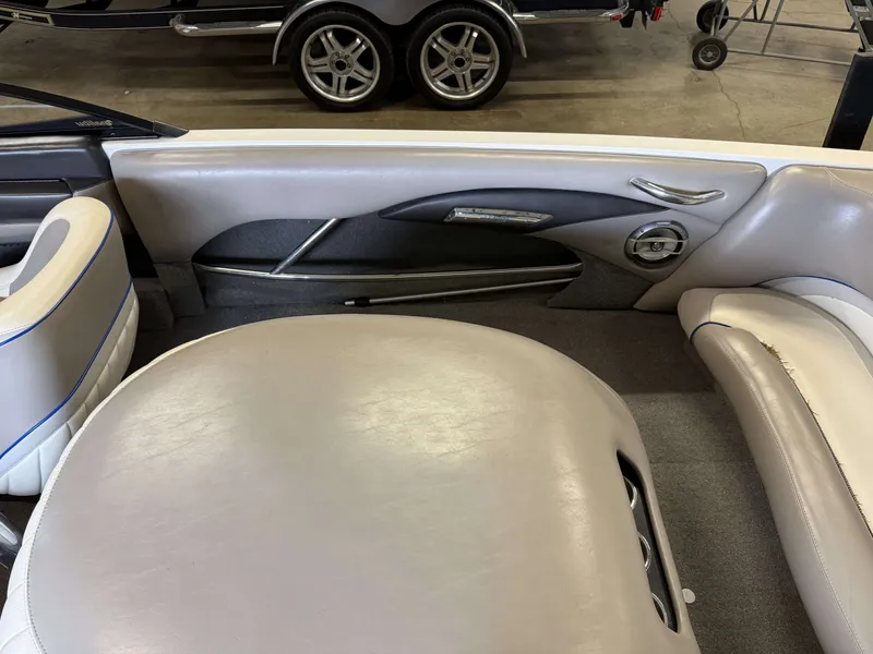 Slide: The Image of Interior of a 2007 Malibu Response LXi boat, gray upholstery. - 16