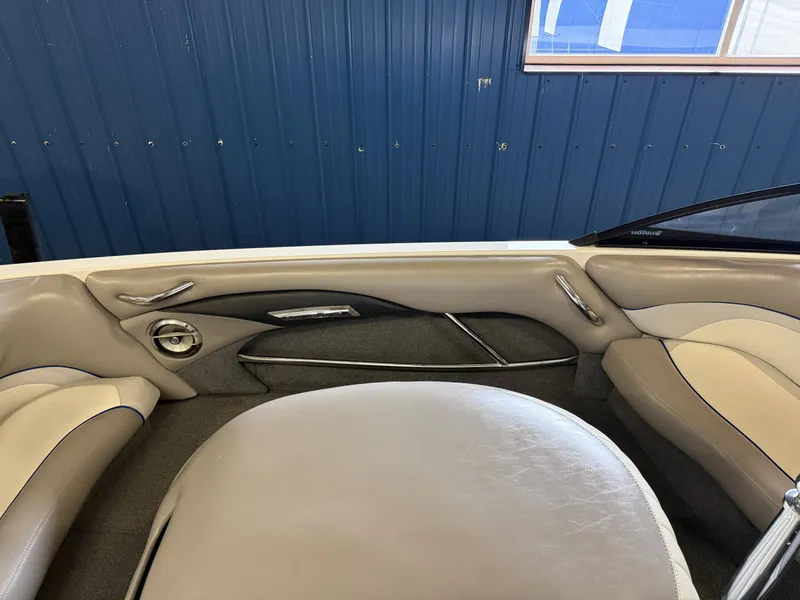 Slide: The Image of Interior of a 2007 Malibu Response LXi boat, gray and beige upholstery. - 17