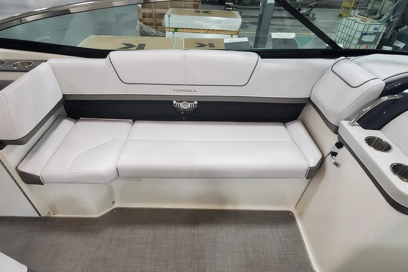 Slide: The Image of 2017 Formula 310 Bowrider interior with white seating and modern design. - 21