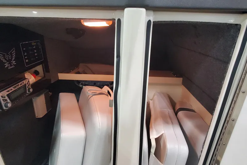 Slide: The Image of Interior cabin of 2017 Formula 310 Bowrider with cushions and control panel. - 27