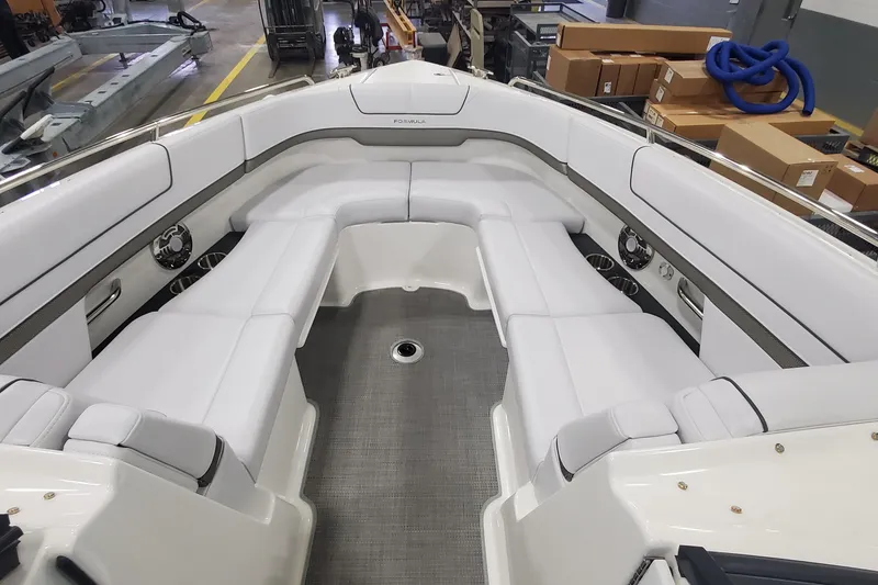 Slide: The Image of 2017 Formula 310 Bowrider interior with white seating and modern design. - 29