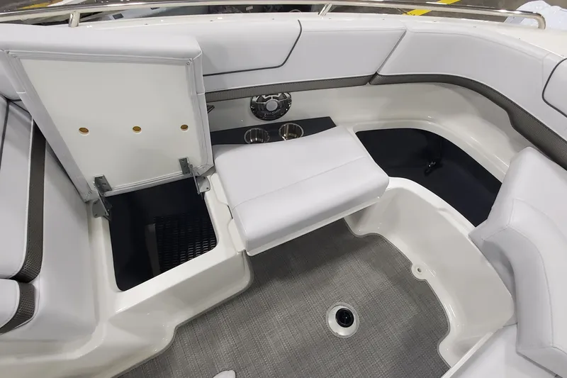 Slide: The Image of Interior of a 2017 Formula 310 Bowrider boat, featuring seating and storage compartments. - 31