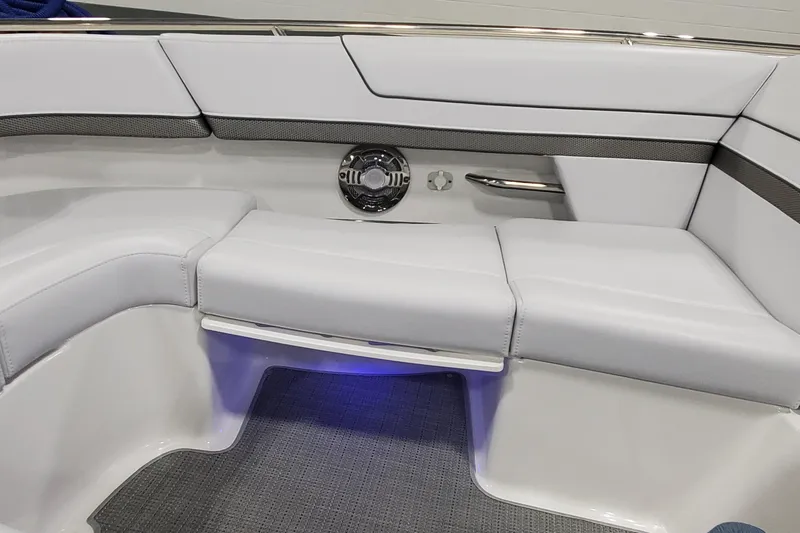 Slide: The Image of Luxurious seating area in a 2017 Formula 310 Bowrider boat with ambient lighting. - 33
