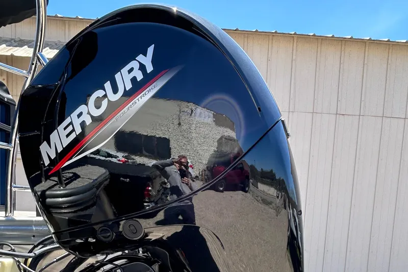 Slide: The Image of Mercury outboard motor on Lowe LS210WT, 2025 model, reflecting surroundings. - 9