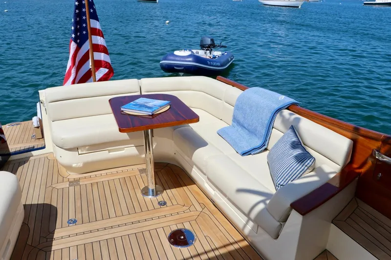Slide: The Image of Luxurious seating area on 2026 Hinckley Talaria 48 MKII yacht with ocean view. - 5