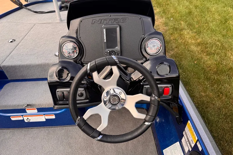 Slide: The Image of Steering console of 2026 Nitro Z17 boat with gauges and controls. - 5