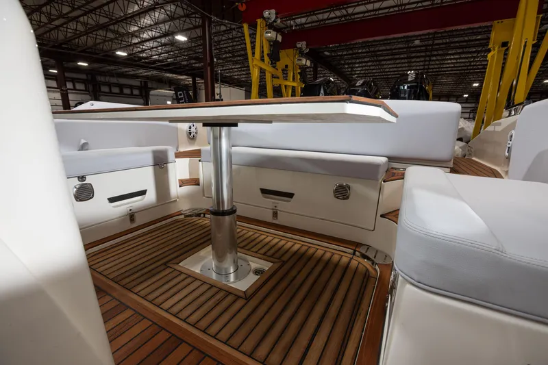 Slide: The Image of Interior view of 2025 Nuova Jolly Prince 38 Sport Cabin with wooden flooring and seating. - 24